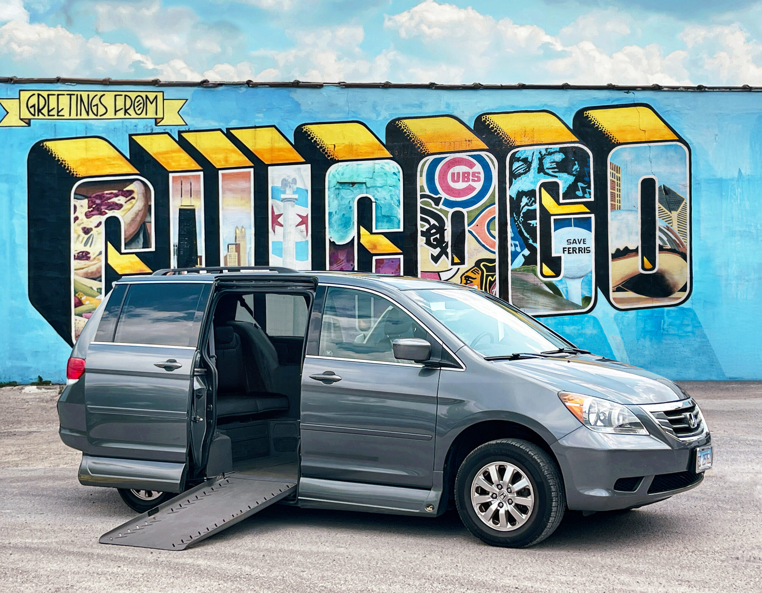 Van in front of Chicago mural